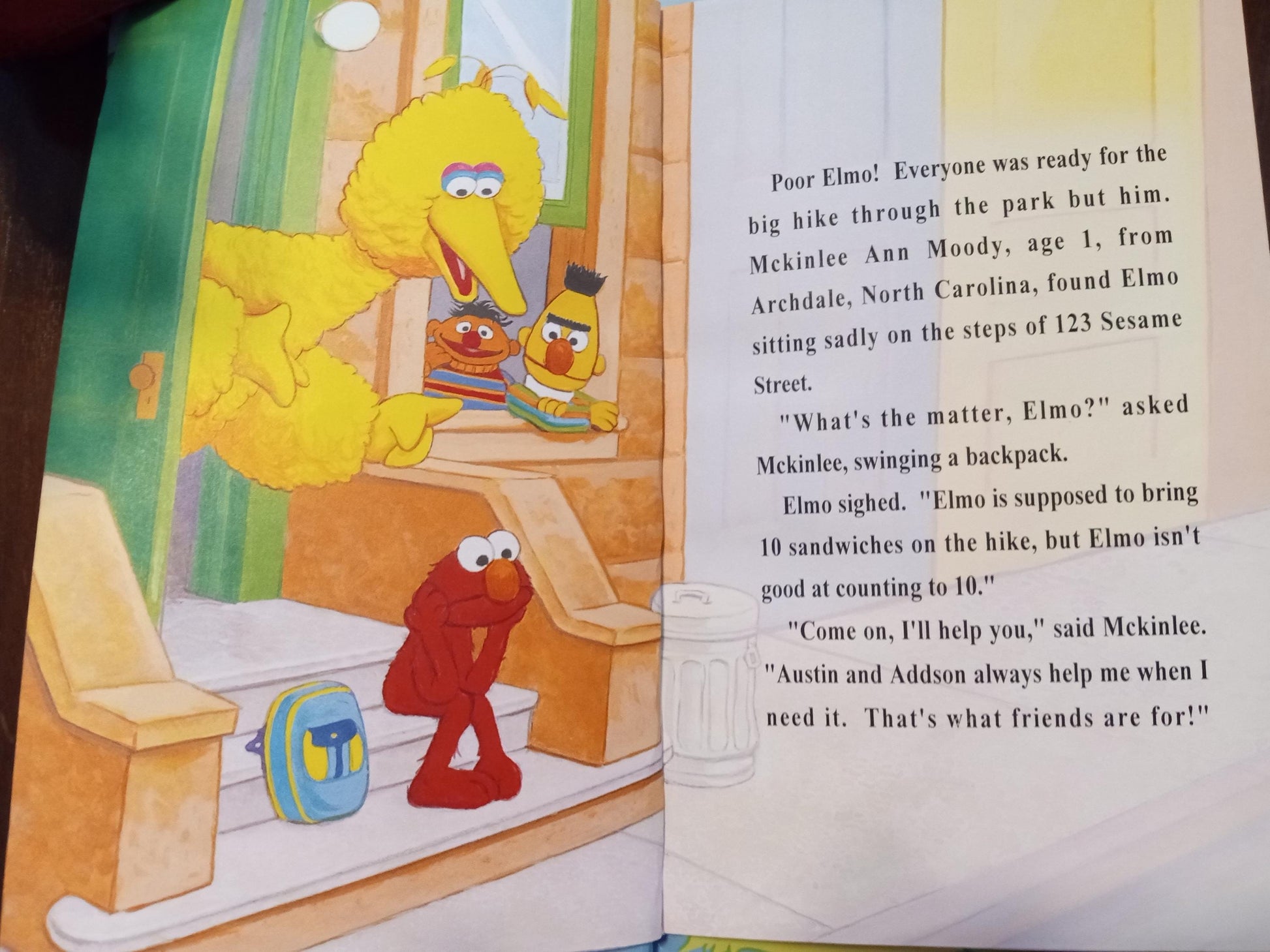 Sesame Street personalized book page with Elmo, Ernie, Big Bird