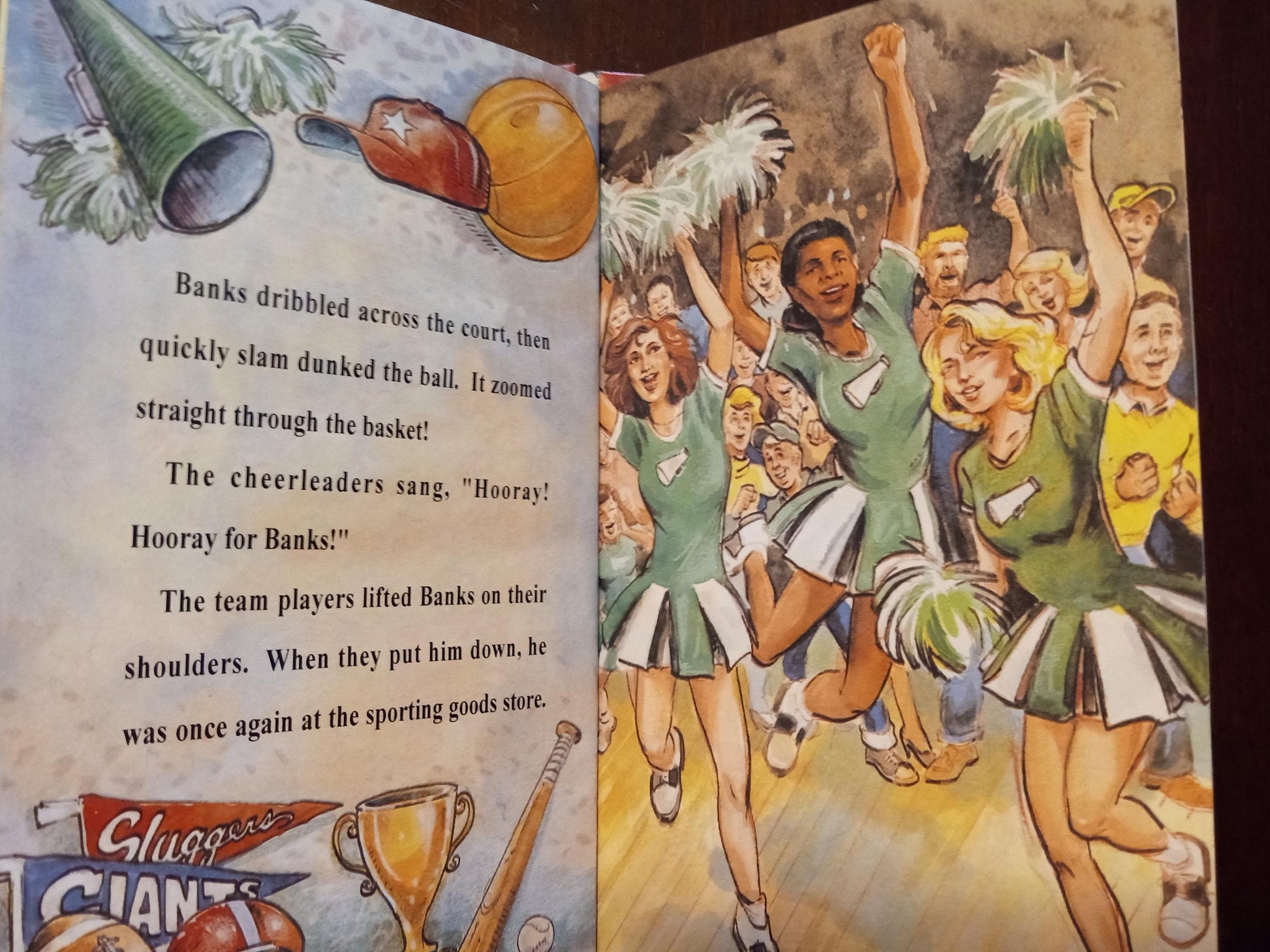 Illustrated personalized book page with cheerleaders and sports-themed text