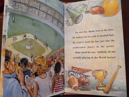 Illustrated personalized book open to a page with a baseball game scene and personalized text sports superstar sample page 2