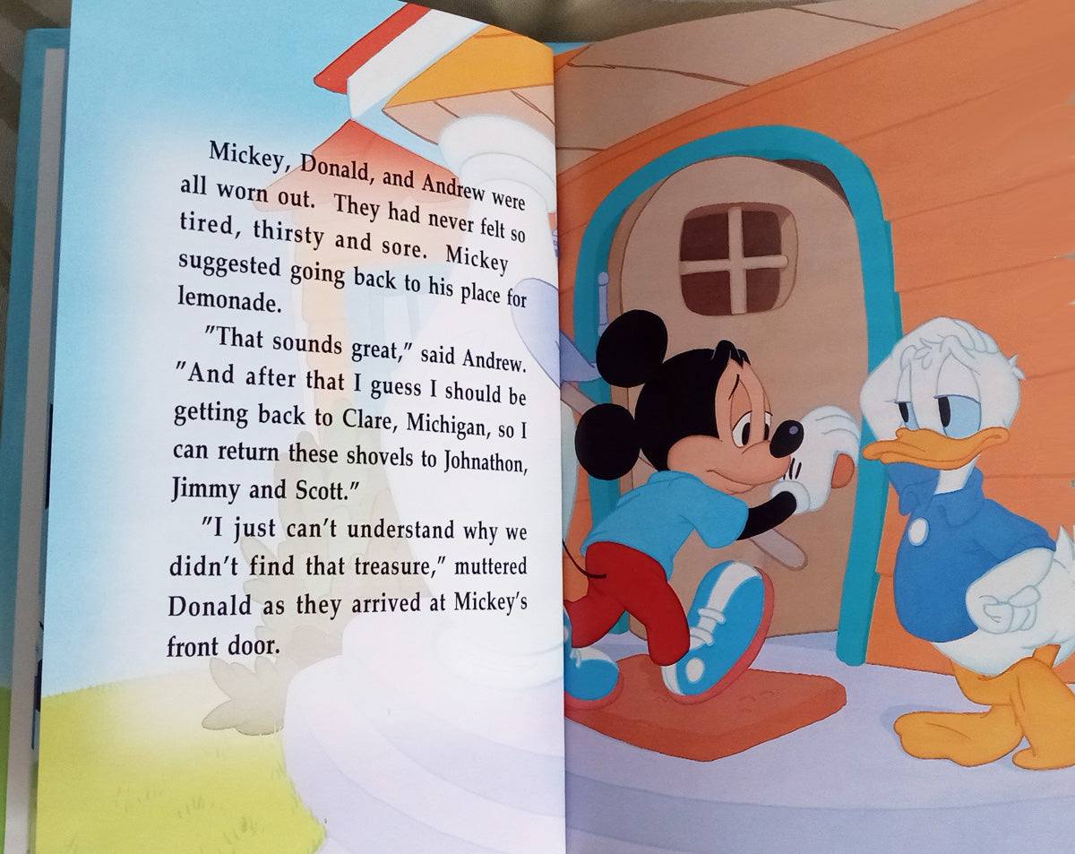Mickey, Donald and 'Andrew' in a personalized adventure book